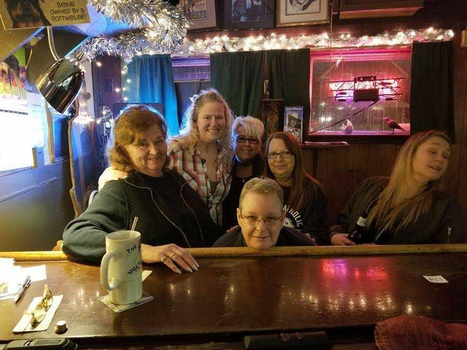 Group picture at the bar.