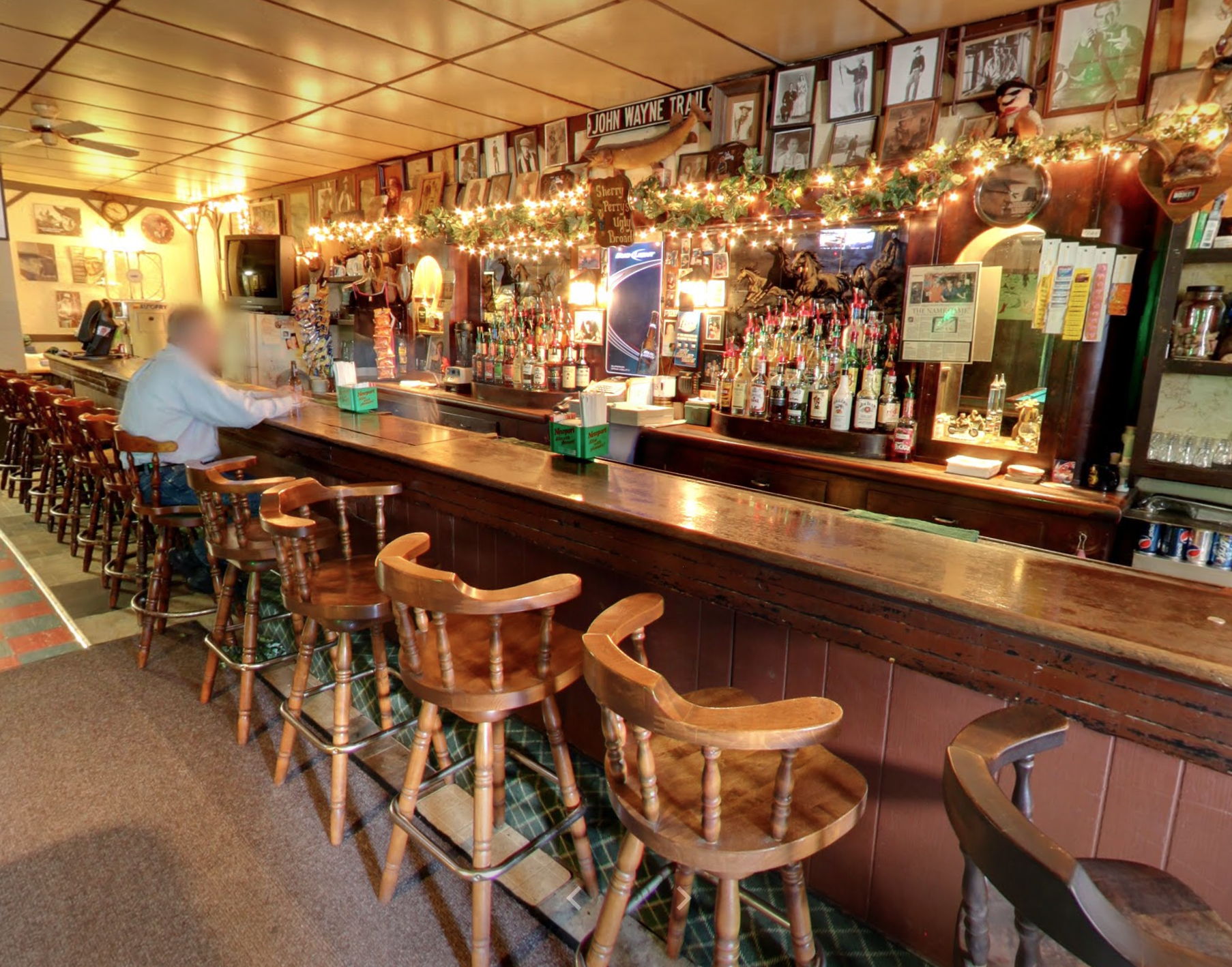 Person sitting at the bar.