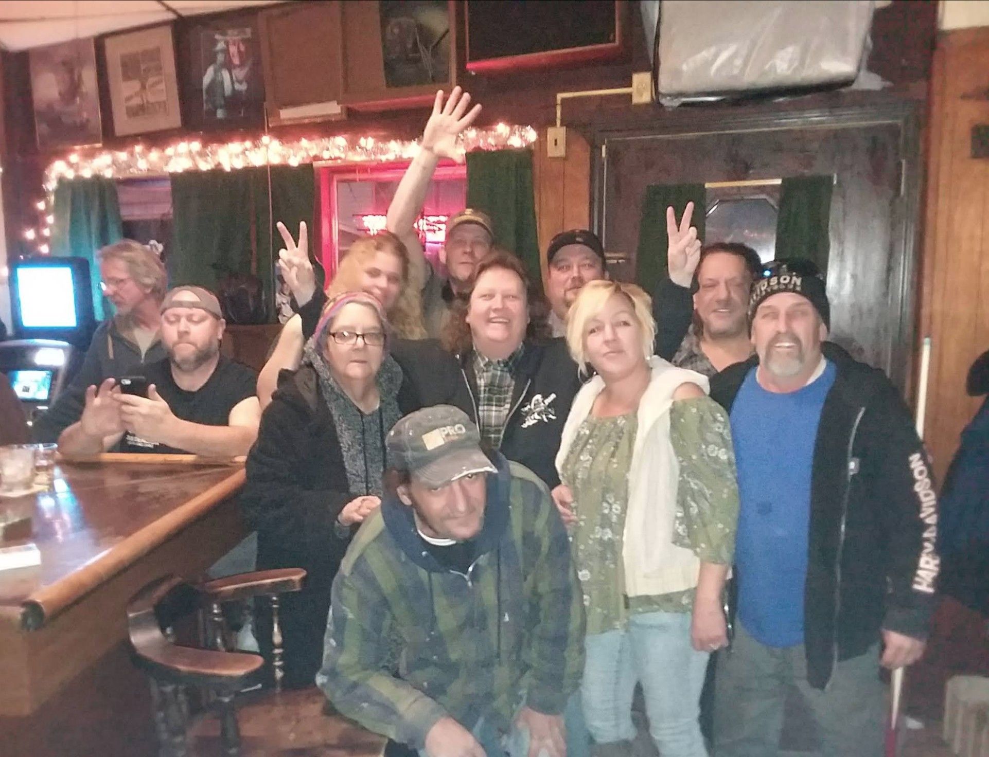Group photo inside The Ugly Broad.