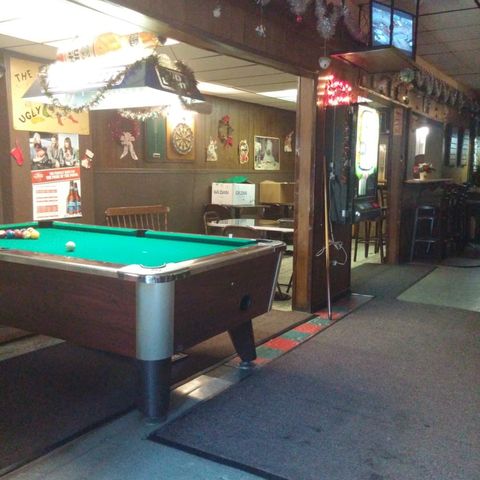 Interior shot of The Ugly Broad showing the pool table.