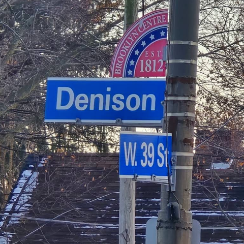 Street signs for the Denison and W 39th St intersection.
