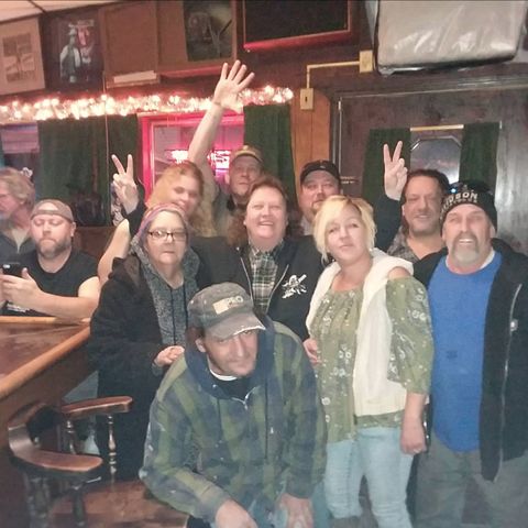 Group photo inside The Ugly Broad.