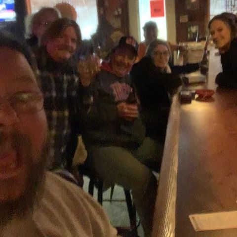 Group of people at the bar.